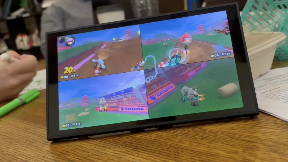 Ilustrasi jailbreak konsol game modern Nintendo Switch 2 menggunakan bantuan kecerdasan buatan AI coding