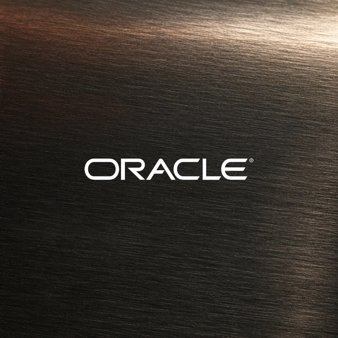 White Oracle wordmark on a dark brushed graphite texture.
