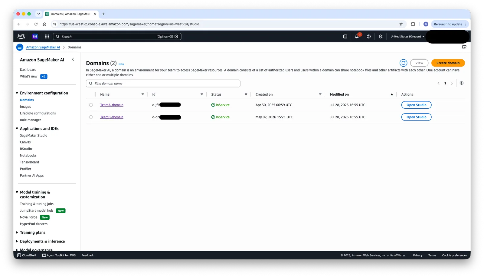 SageMaker console listing TeamA-domain and TeamB-domain